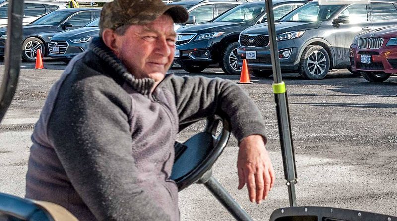 Dave Creighton in his beloved golf cart.