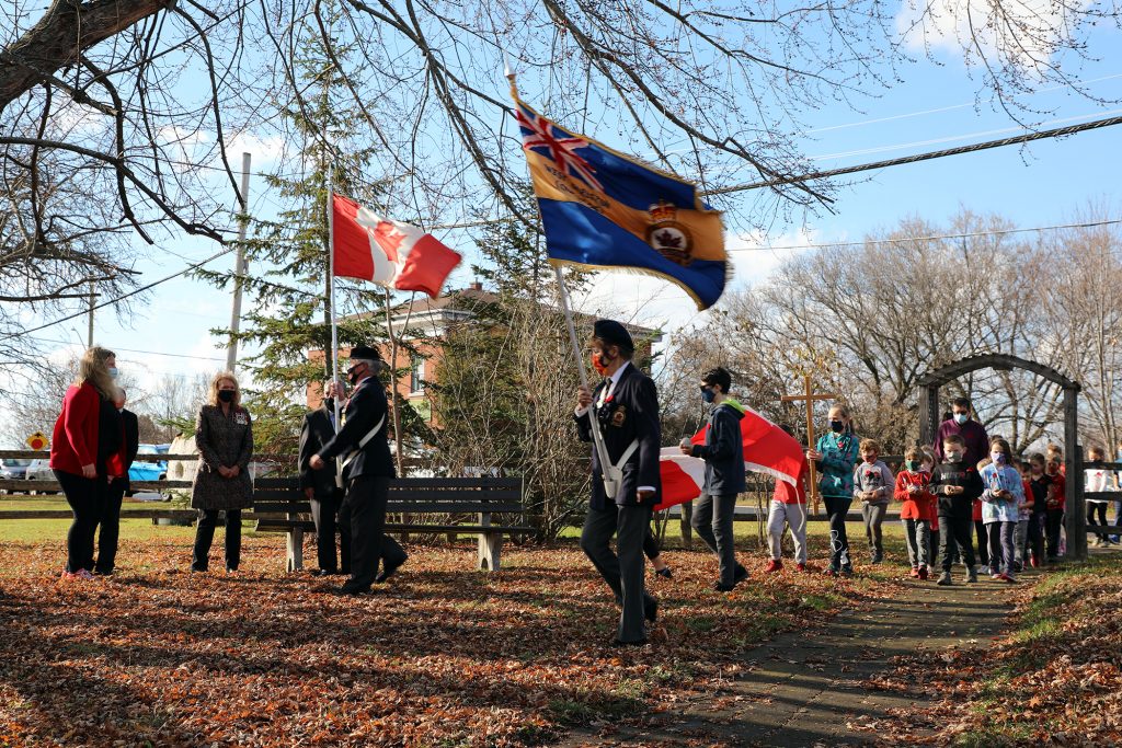 St. Michael's students are led in to Memorial Park by the Branch 616 Colour Guard.