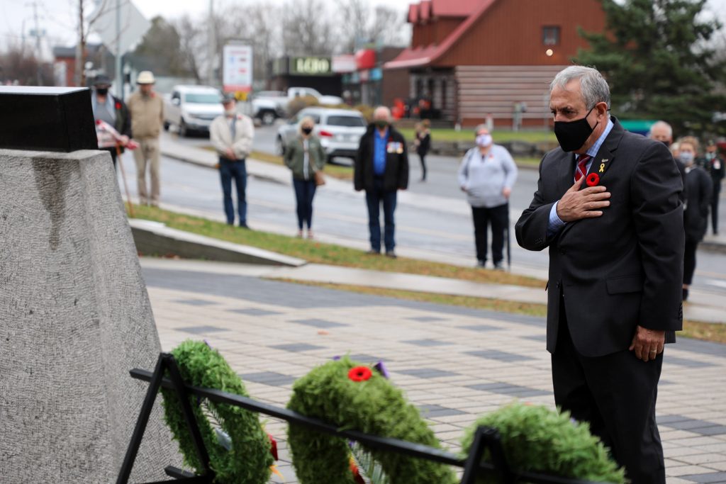 Coun. Eli El-Chantiry lays a wreath during today's ceremony.