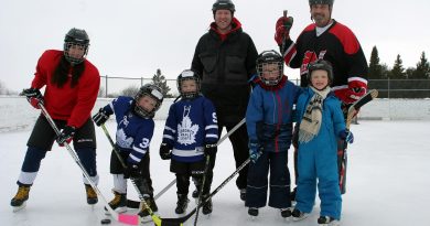 Skaters pose for a photo on the Corkery outdoor rink.