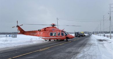 An ORNGE helicopter prepares to transport a patient to hospital.