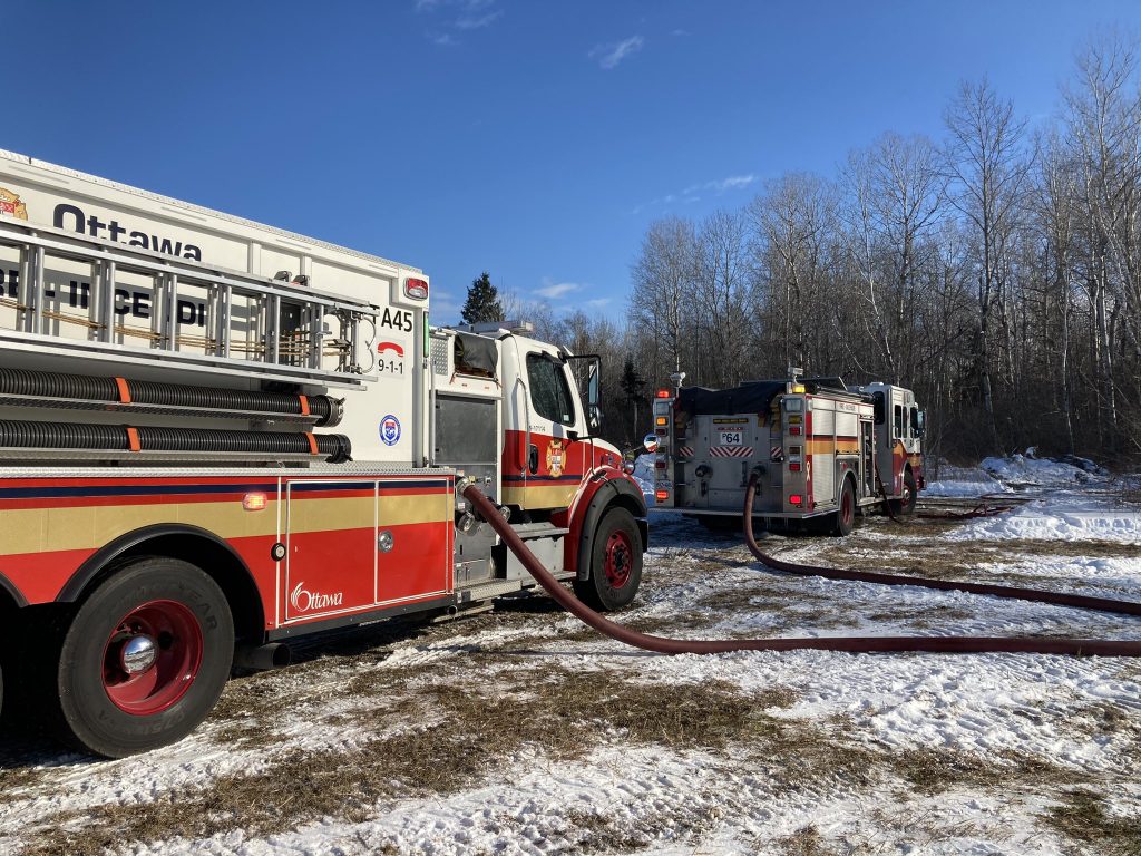 A photo of fire trucks on scene.