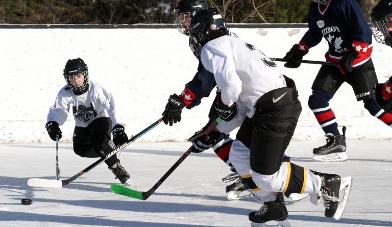 Players enjoying a game of hockey in the WCOHL.