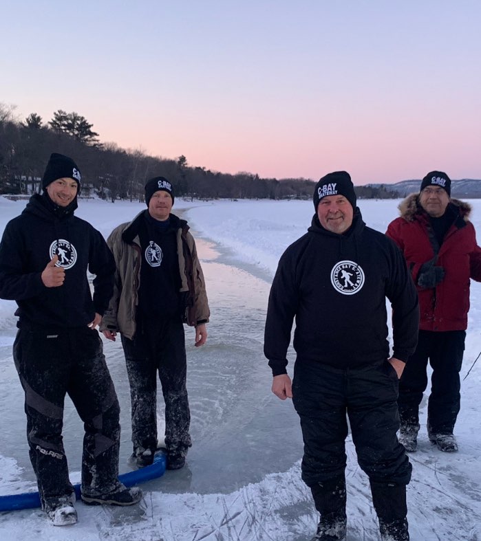 Skateway volunteers show off their swag.