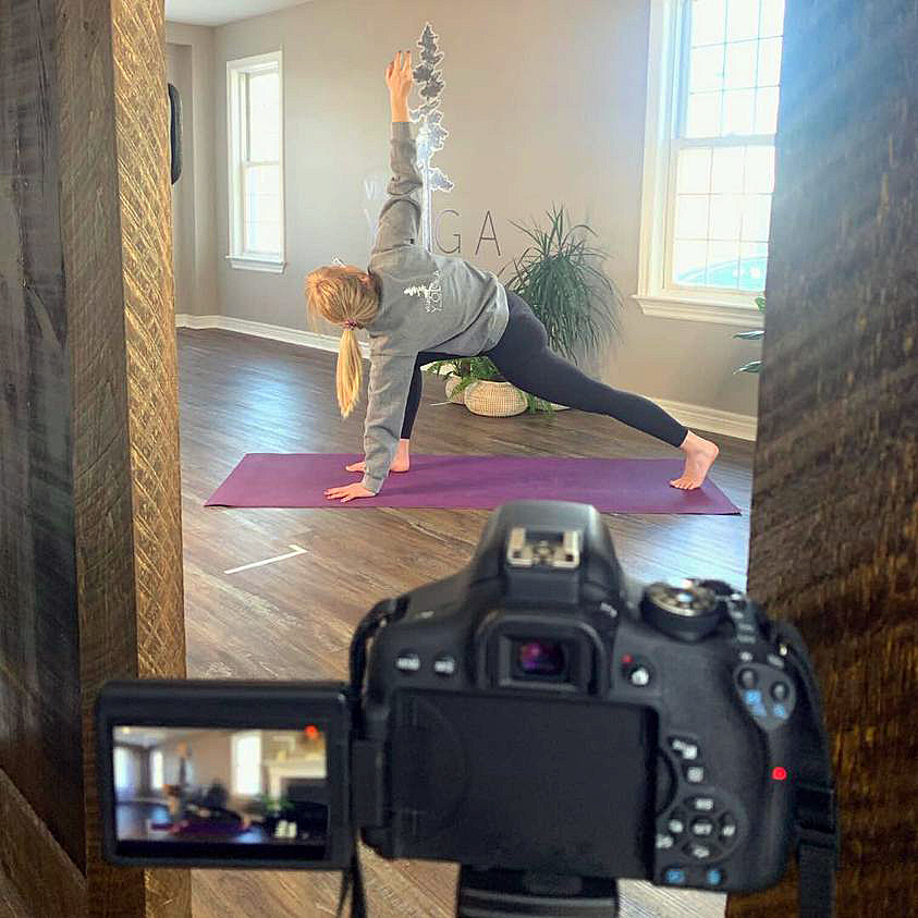 A yogi practices at Village Yoga.