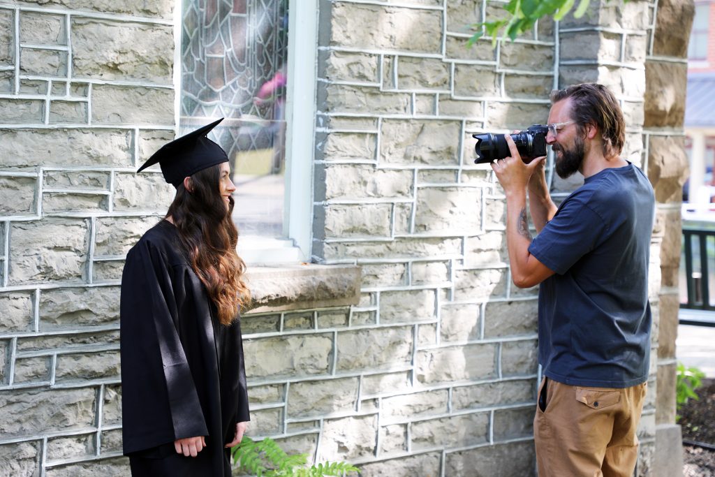 All Saints graduate Megan Callandar poses for a graduation photo.