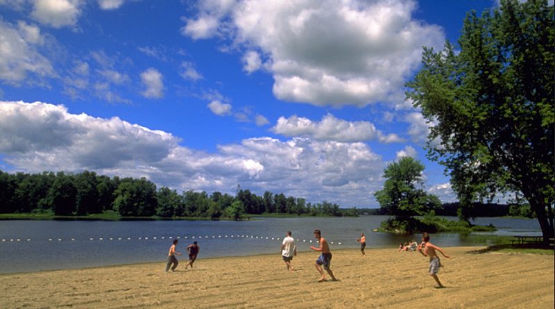 A photo of people enjoying Fitroy Provincial Park's beach.