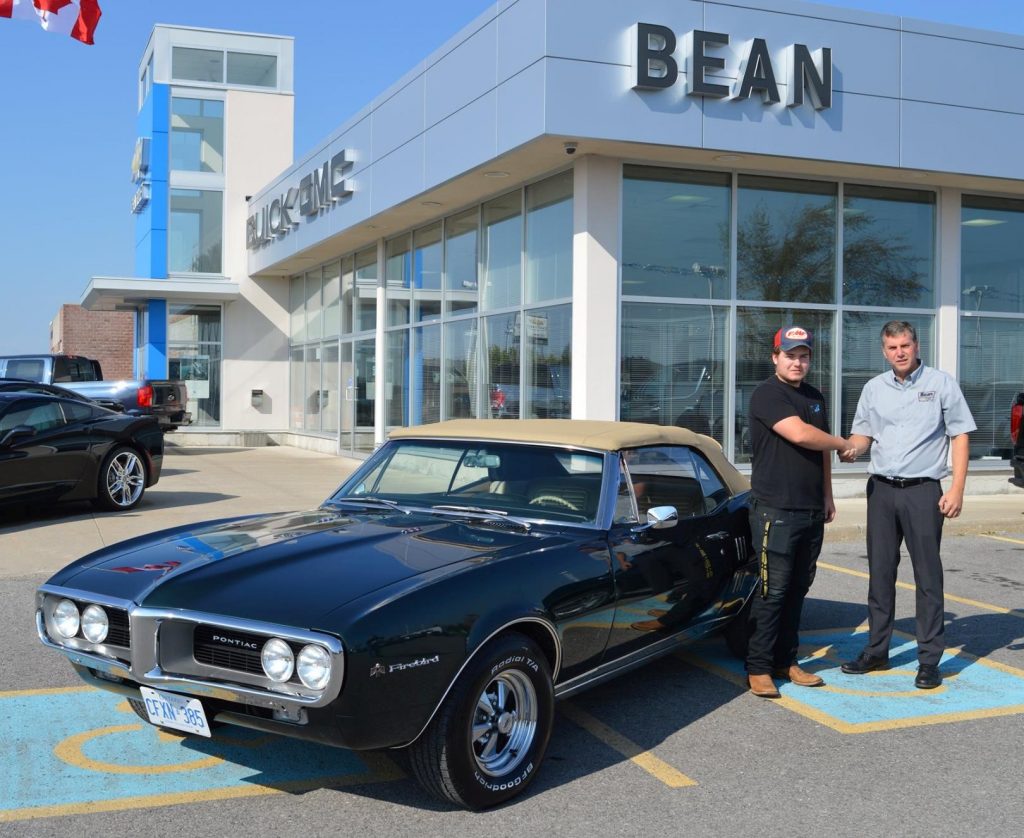 Jordan Waito receives the keys to his new car.