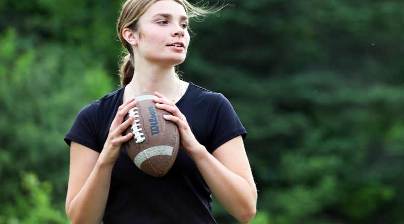 A photo of Anna King playing football.