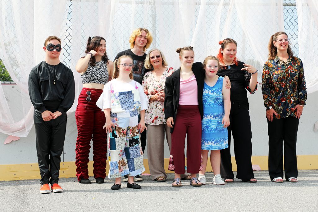 The models pose for a photo following the show. In the back, from lef,t are Charlotte Riethman, Thomas Murray, Sharon Demers, Laura Taffinder and Cailin Vierich. In front are Keenan Dressler, Sarah Madore, Saskia Lucuik and Angela Knott. Photo by Jake Davies