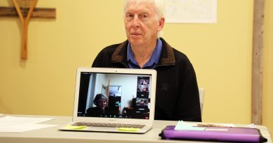 A photo of Dr. Barry Bruce and his computer.
