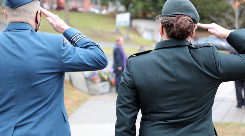 Two soldiers salute during West Carleton's 2020 Remembrance Day Service.