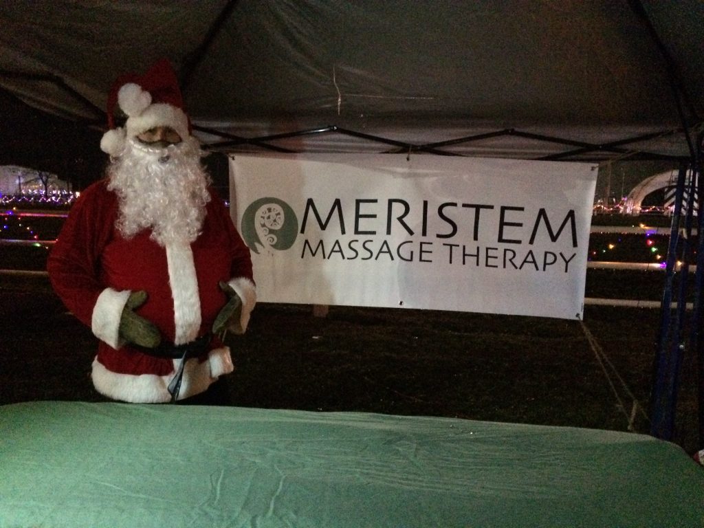 A photo of Santa about to get a massage.