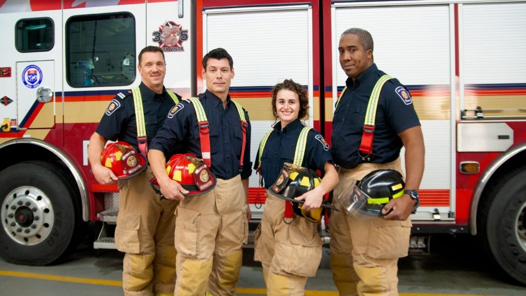 A groupl photo of firefighters.