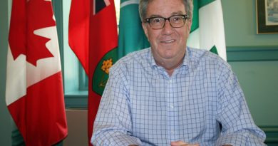 A photo of Mayor Jim Watson in his office.