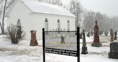 A photo of a church and the Diamonview Cemetary.