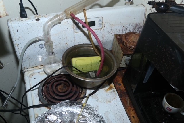 A photo of a makeshift lab on a stove.