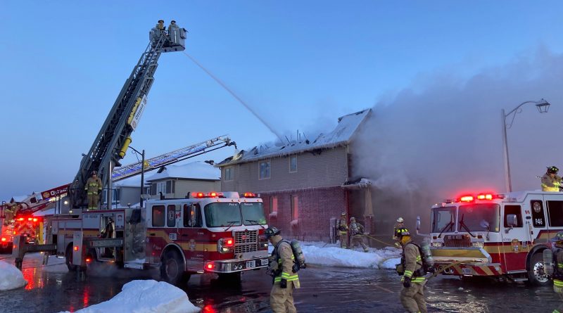A photo of firefighters battling a fire in Stittsville.