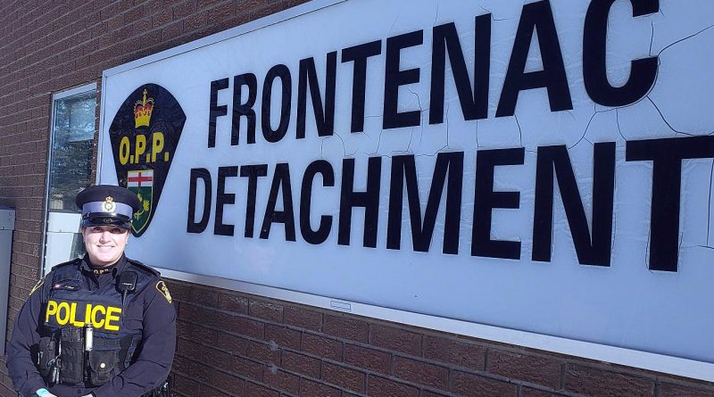 A photo of Sgt. Jen Coles in front of the Frontenac detachment.