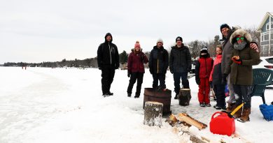A photo of people enoying a fire on the Constance Bay Skateway.