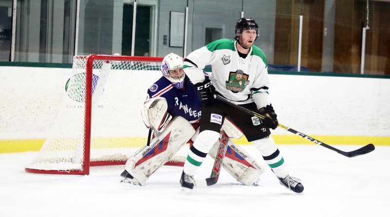 A photo of the Rivermen playing hockey.
