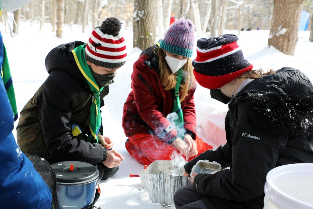 A photo of scouts cooking.