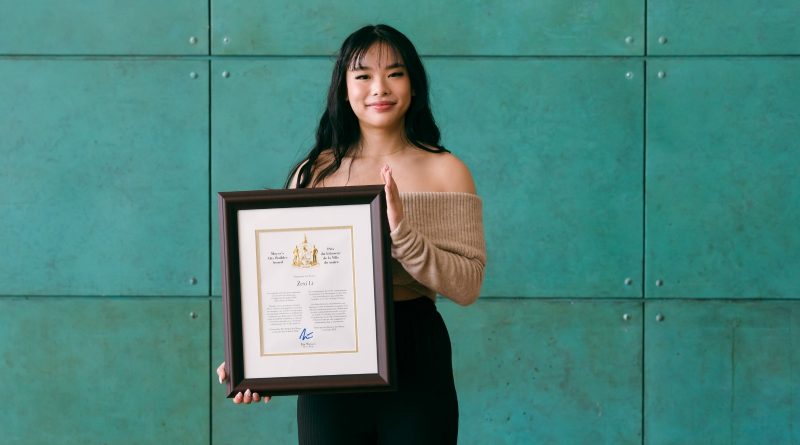 A photo of Lexi Li with her City Builder award.
