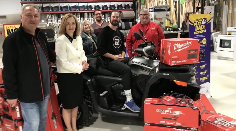 Hussein Habbal (Throttle PowerSports), Mary Wilson Trider (AGH FVM), Louise Beckinsale (GilligalouBird Store), Adam Guest (Throttle PowerSports) and Thomas Levi (Levi Home Hardware) join Antoine Pruneau (Ottawa Red Blacks) at the launch of play4dads.ca