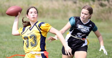 A photo of girls flag football action.