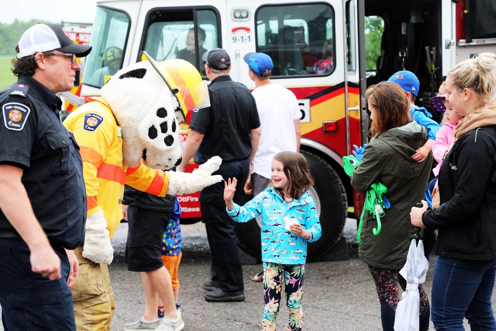 Sparky gives a high five.