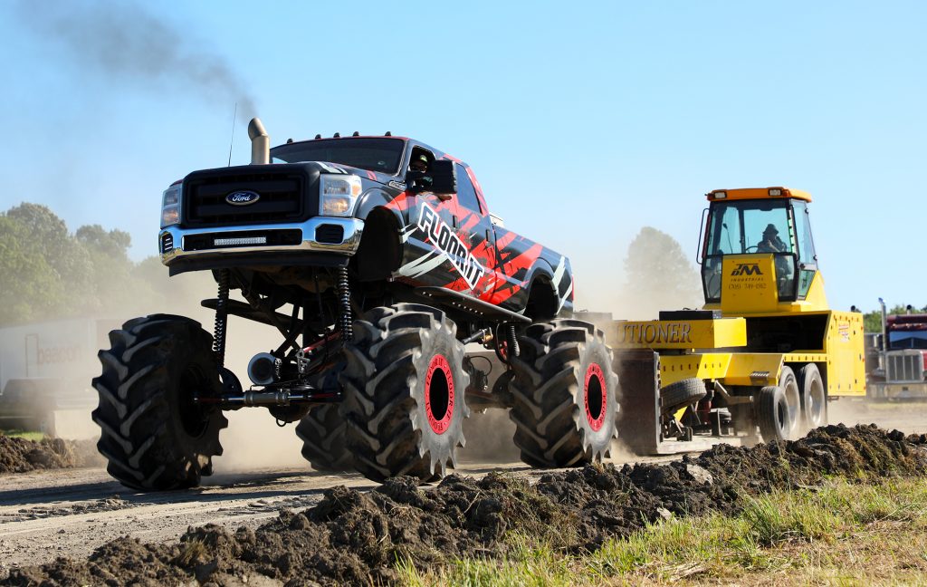 A photo of a monster truck in a tractor pull.