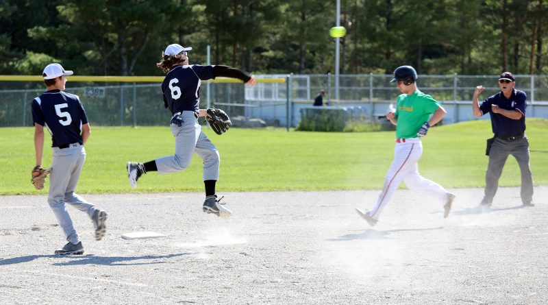 Kinburn’s Brett Almeida (5) partners with Calabogie’s Dawson Pennock (5) to start off a double-play during the Eectric’s semi-final game against Carlsbad last Sunday. Photo by Jake Davies