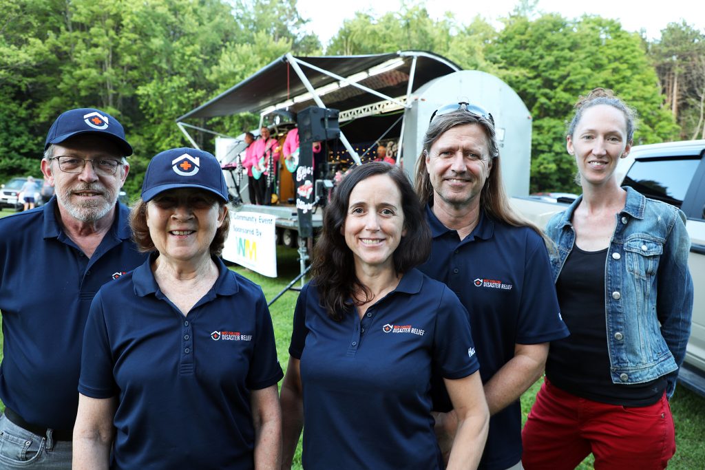 From left, WCDR board members Glyn Storey, Judy Makin, Heather Lucente, Haans Baader and Katherine Woodward pose for a photo at the concert. Photo by Jake Davies