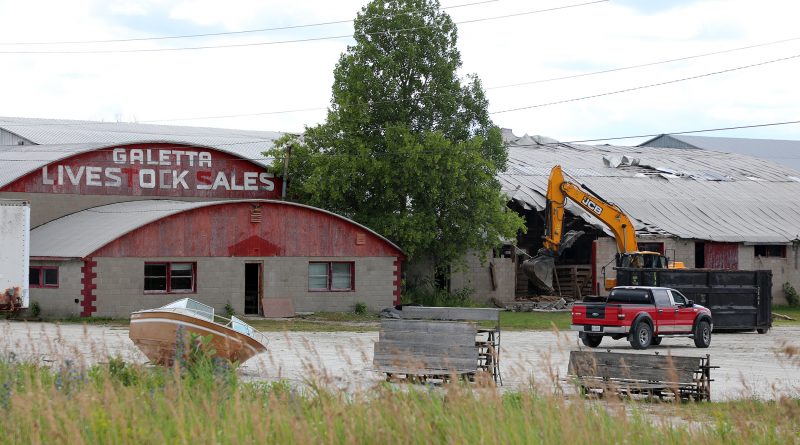 A photo of the Galetta sales barn being demolished.