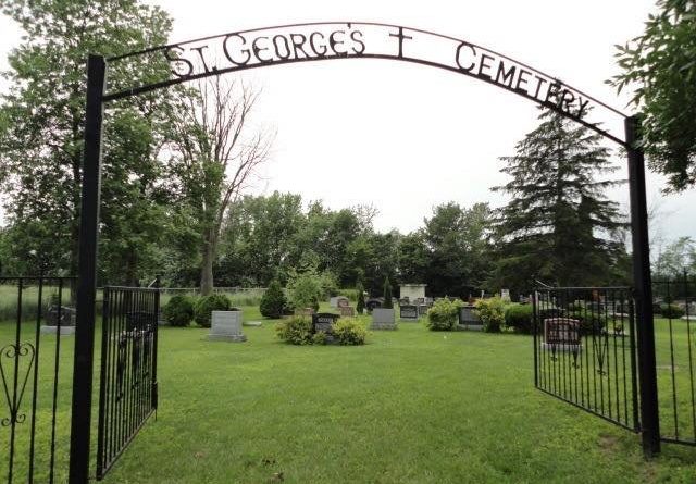 A photo of the gates to the cemetery.