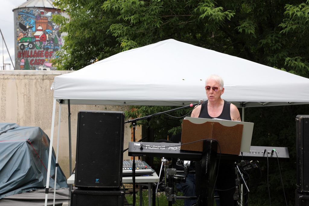 A photo of Dr. Barry Bruce performing live music.