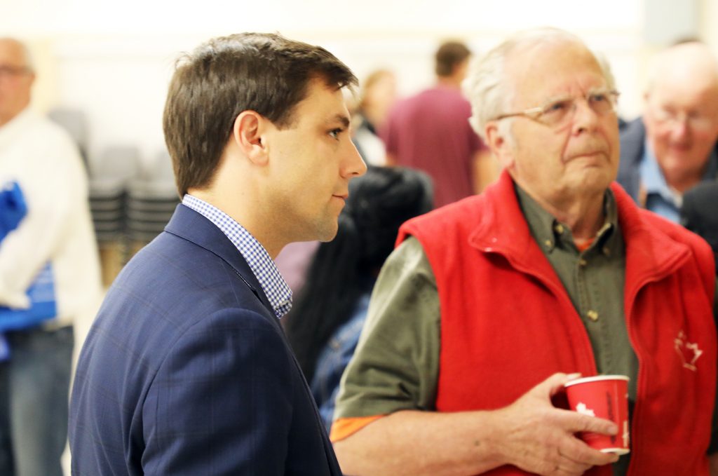 clarke Kelly talks to a voter.