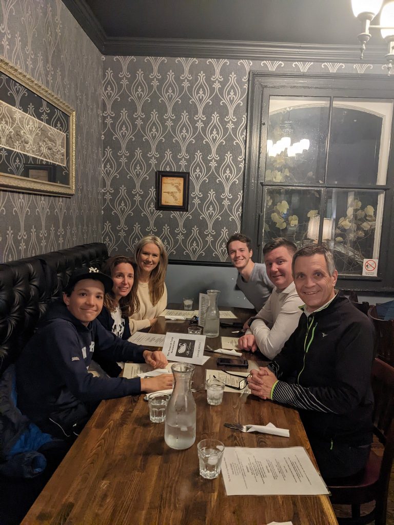 A photo of people having dinner.