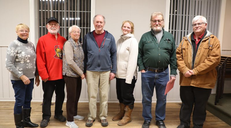 From left, outgoing GCA executive members Patricia Rose, David Jefferies and Sandra Fletcher pose with the new GCA board including treasurer Graham Murray, secretary Emily Bahm, President Norm Ross and vice president Bruce Sample. Photo by Jake Davies