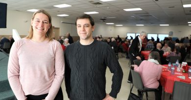 Two councillors pose at the KSA Christmas luncheon.