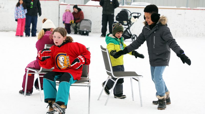 A photo of kids playing musical chairs.