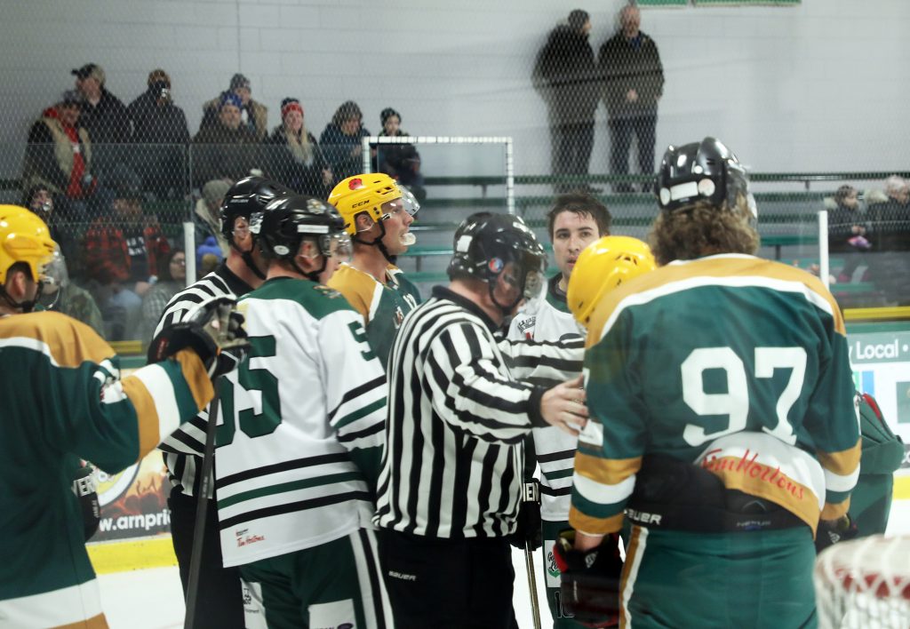 A photo of a hockey scrum.