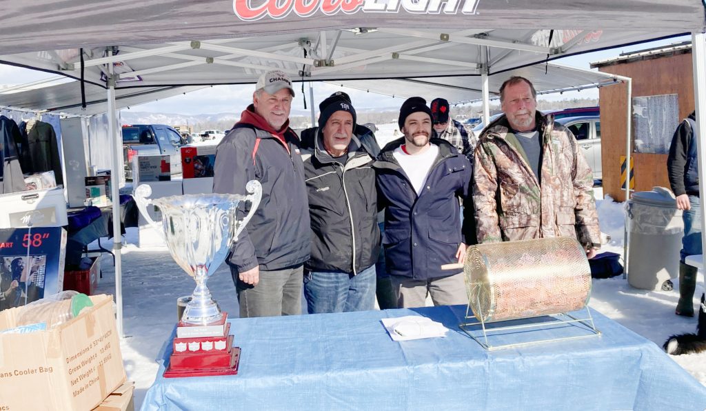 A group of people at a fishing derby.