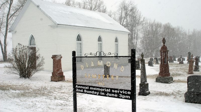 A photo of a church in winter.
