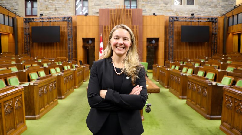 Jenna Sudds standing in the House of Commons.