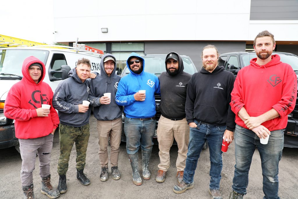 A group of volunteers pose for a photo.