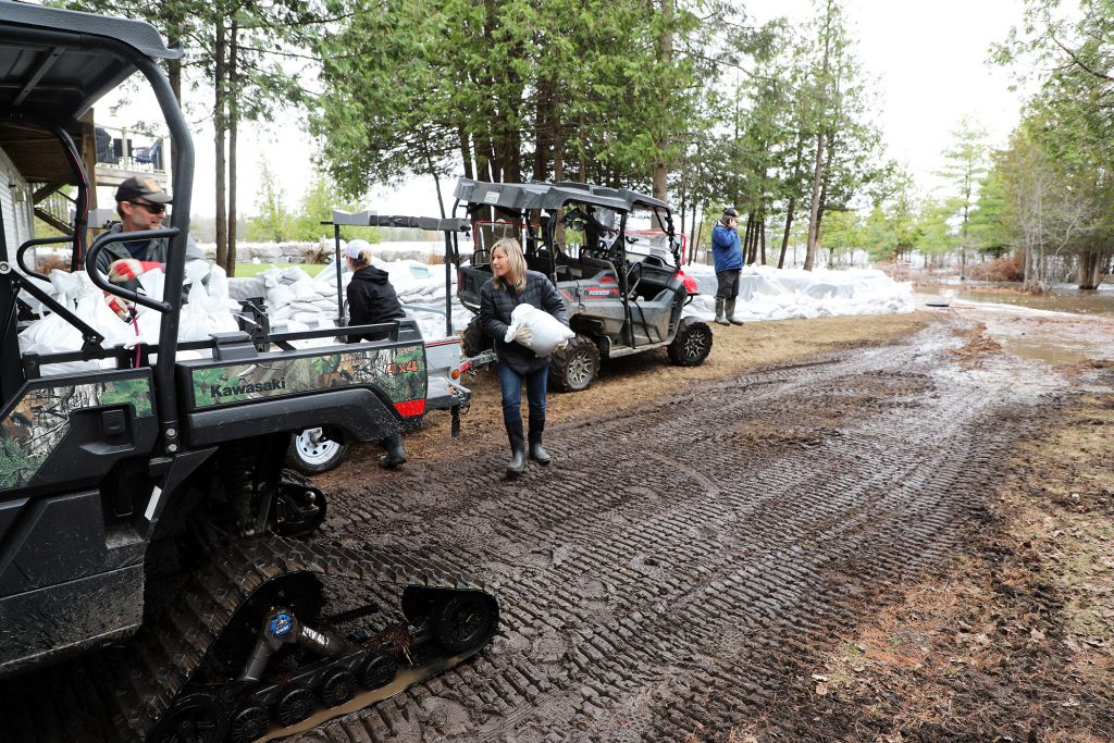 People place sandbags.