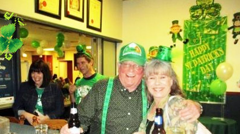 A photo of two people enjoying St. Patrick's Day.