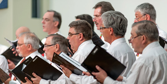 A photo of a chorus singing.