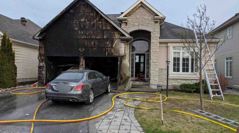 A photo of a burned out garage.